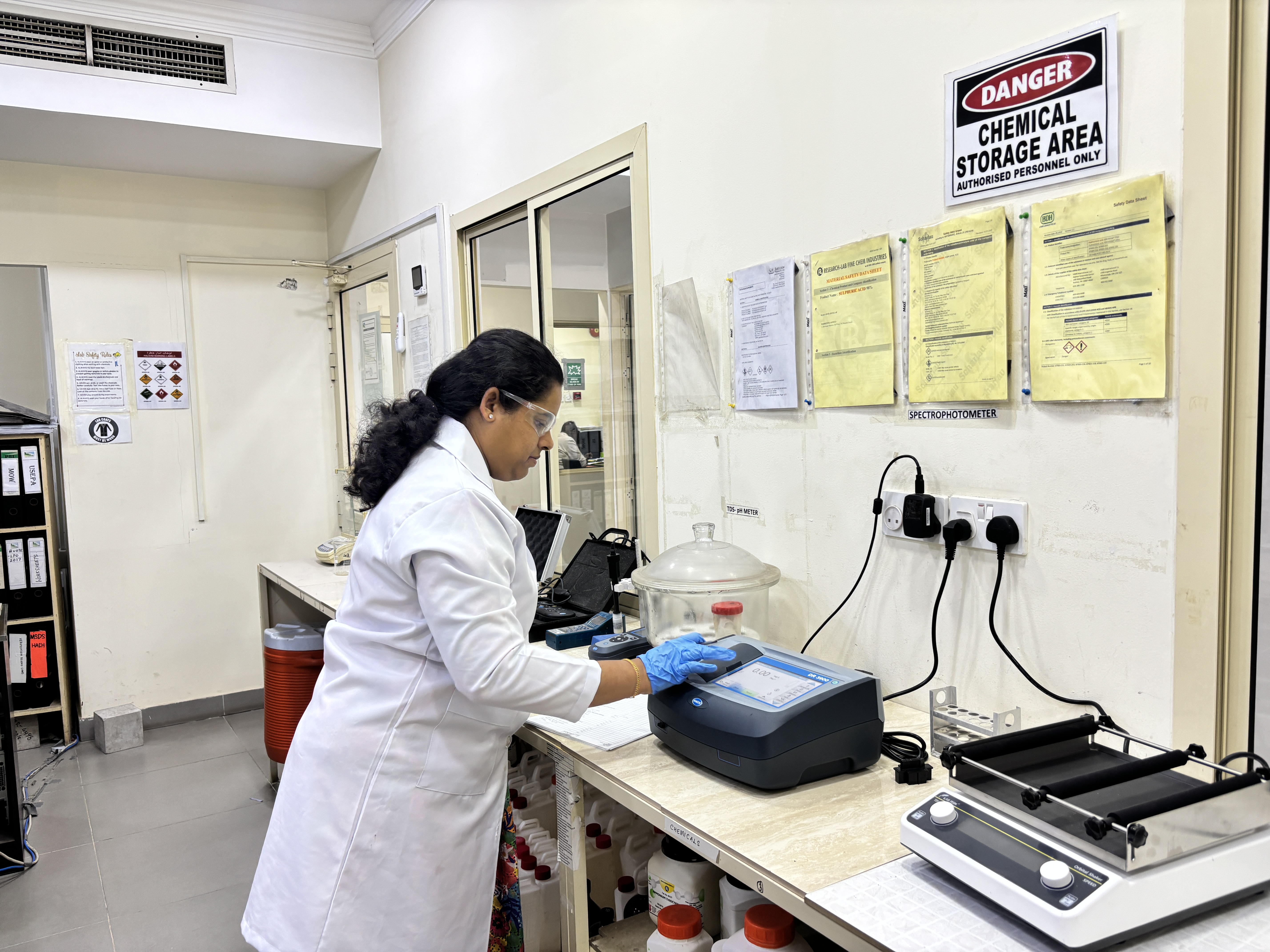 QEL laboratory technician performing accredited chemical analysis